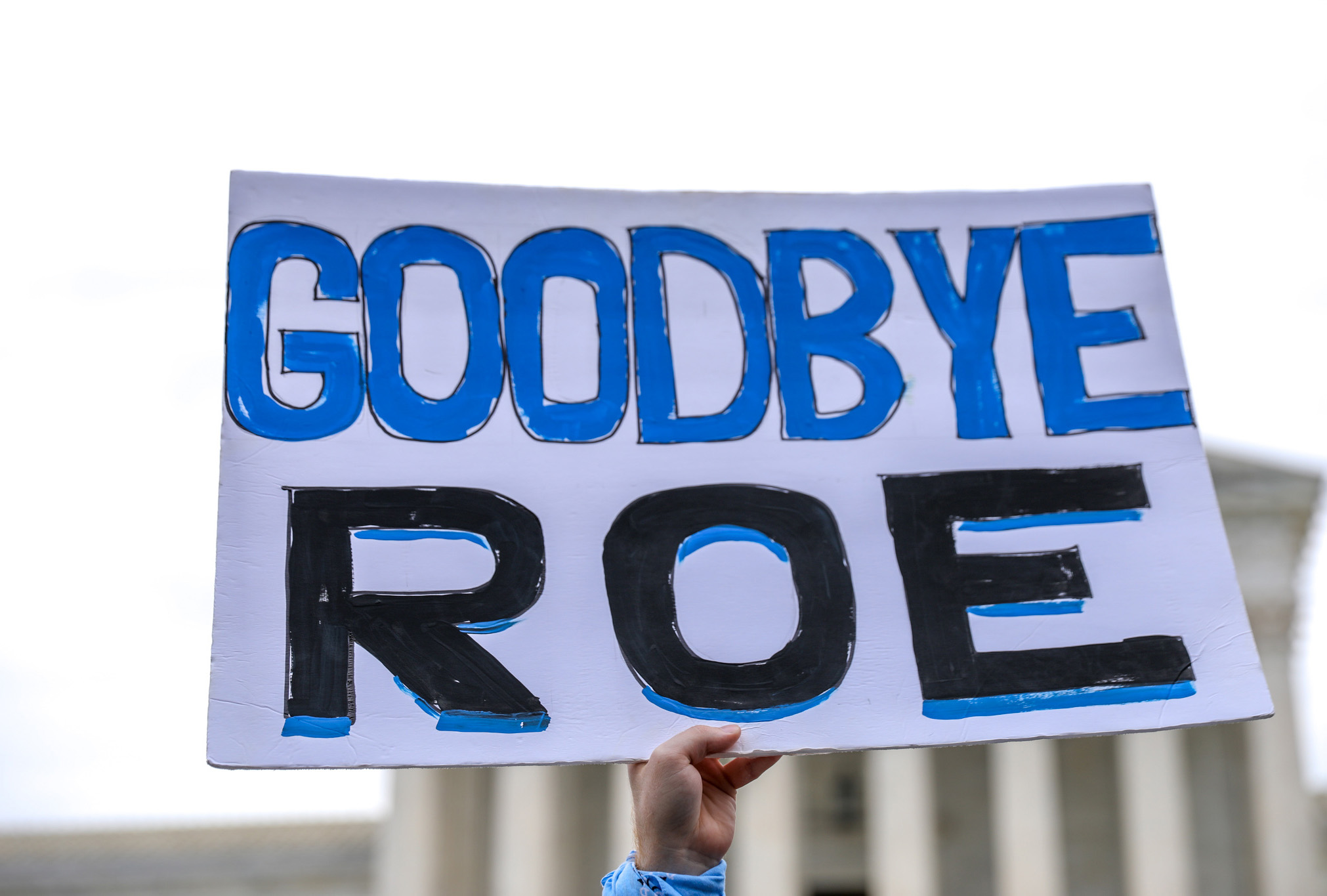 Protesters from both sides of the abortion debate wave competing scripture interpretations during a rally outside the U.S. Supreme Court in Washington, DC., United States on June 21, 2022. (Yasin Ozturk/Anadolu Agency via Getty Images)