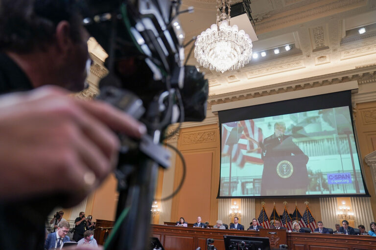Photos of then-President Trump are shown during a House Select Committee to Investigate the January 6th hearing in the Cannon House Office Building on Thursday, June 16, 2022 in Washington, DC. (Kent Nishimura / Los Angeles Times via Getty Images)