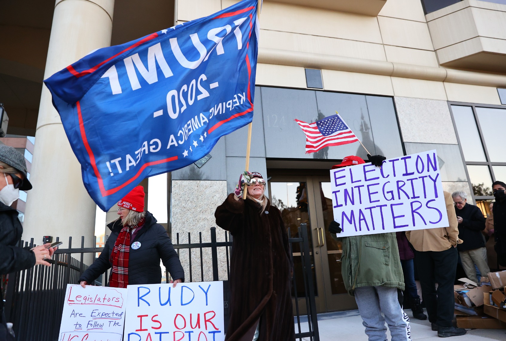 Supporters of Donald Trump gather outside the Michigan House Oversight building on December 2, 2020 in Lansing, Michigan. (Rey Del Rio/Getty Images)
