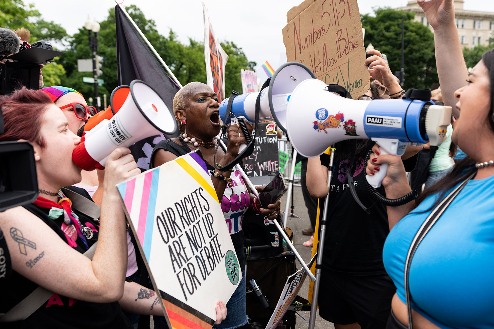 Pro-choice and pro-life activists shout each other down with megaphones outside of the U.S. Supreme Court as they wait for the court to hand down its decision on Dobbs v. Jackson to overturn Roe v. Wade on Tuesday morning, June 21, 2022. (Bill Clark/CQ-Roll Call, Inc via Getty Images)