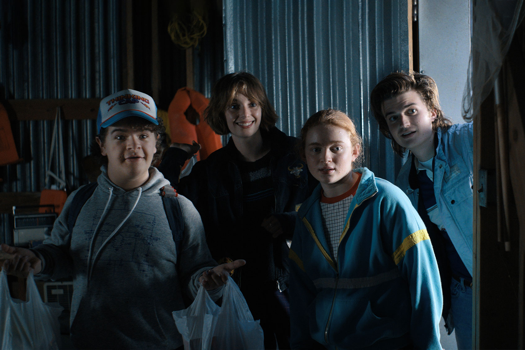 Gaten Matarazzo as Dustin Henderson, Maya Hawke as Robin Buckley, Sadie Sink as Max Mayfield, and Joe Keery as Steve Harrington in "Stranger Things" (Netflix)
