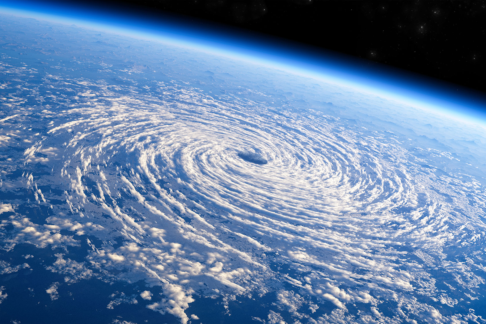 Satellite view of the eye of a tropical storm, hurricane (Getty Images/Naeblys)