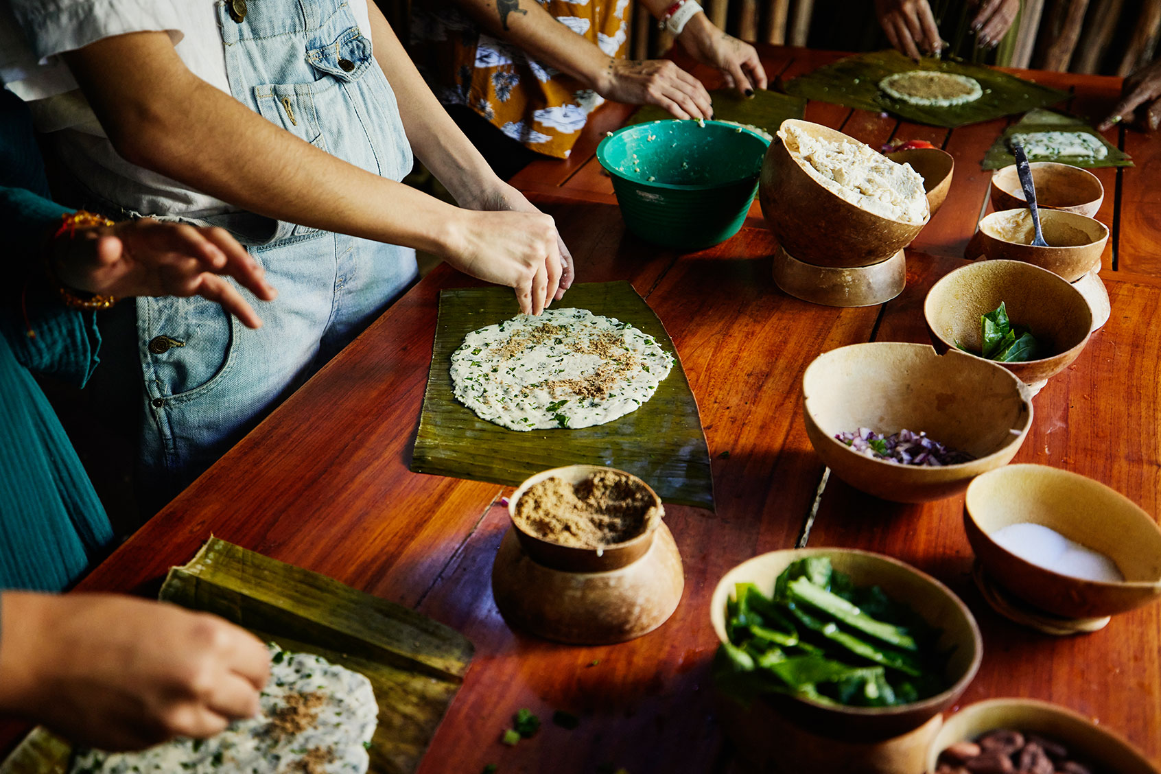 Woman making Mayan tamale (Getty Images/Thomas Barwick)