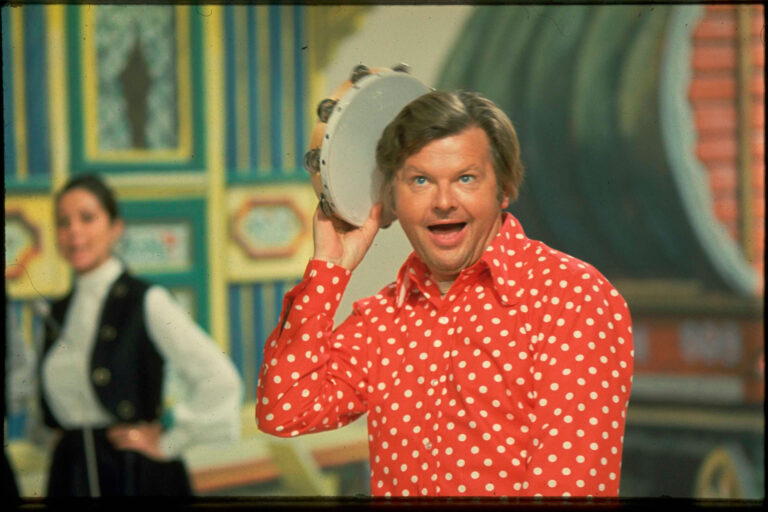 Comedian Benny Hill performing with a tambourine on set, circa 1971. (TV Times via Getty Images)