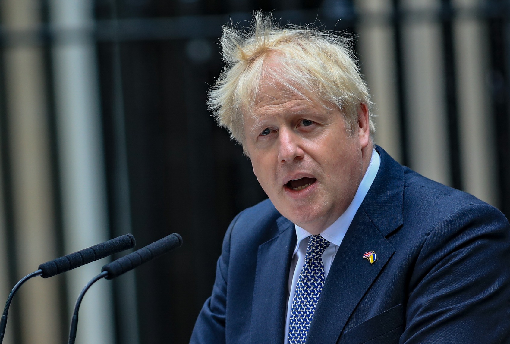British Prime Minister Boris Johnson gives a statement outside 10 Downing Street announcing his resignation as the leader of the Conservative Party as he intends to stay on as caretaker Prime Minister until a new leader is elected in autumn in London, United Kingdom on July 07, 2022. (Vudi Xhymshiti/Anadolu Agency via Getty Images)