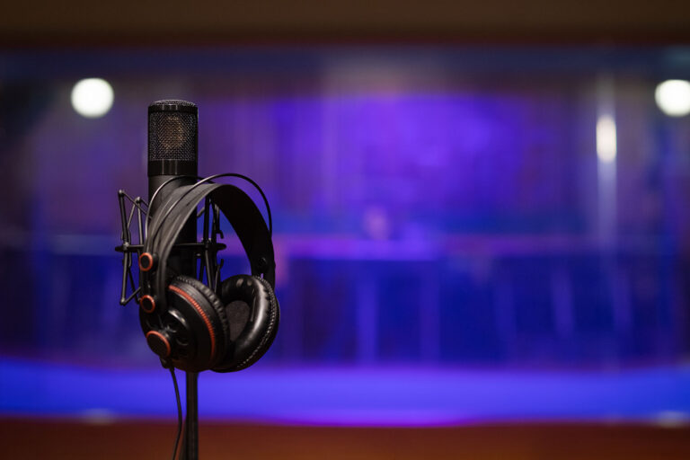 Condenser Microphone On Boom Stand With Headphones (Getty Images/Tashi-Delek)