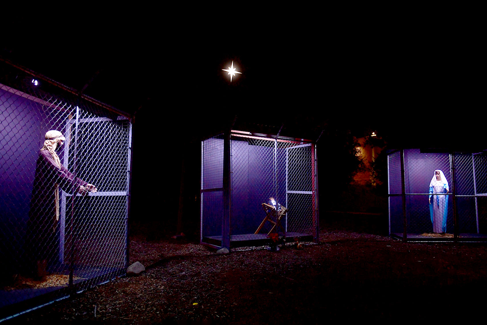 The Nativity scene at the Claremont United Methodist Church in Claremont, California on December 10, 2019, depicting a scene of Jesus, Mary and Joseph in separate cages as refugees. (FREDERIC J. BROWN/AFP via Getty Images)