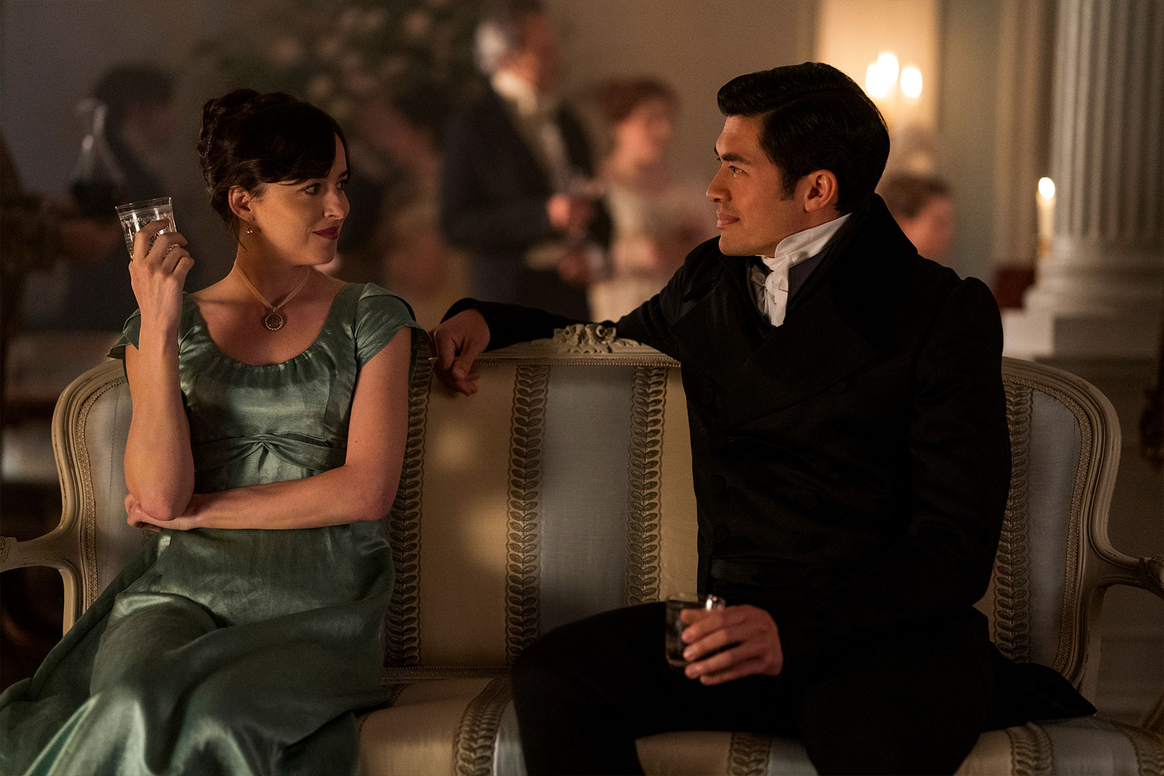 Dakota Johnson as Anne Elliot and Henry Golding as Mr. Elliot in "Persuasion" (Nick Wall/Netflix)