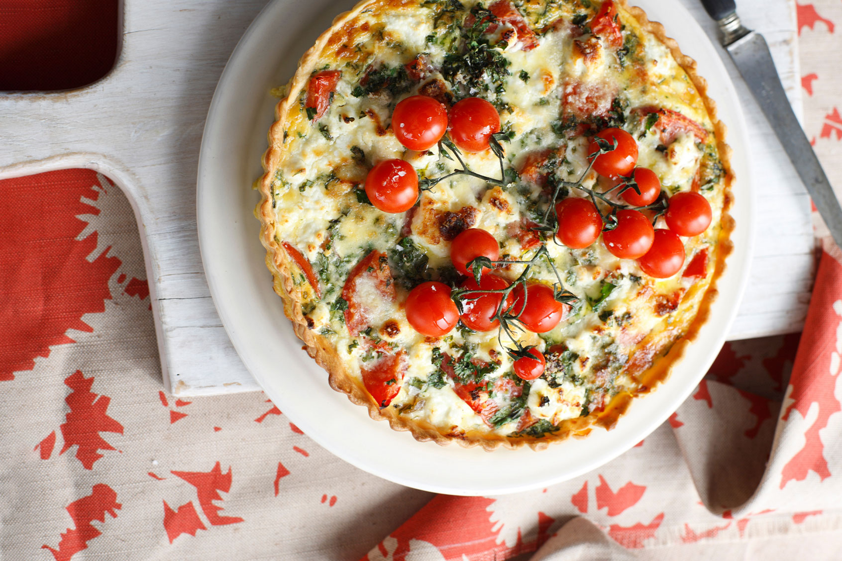 Tomato and red pepper tart with garnish (Getty Images/Brett Stevens)