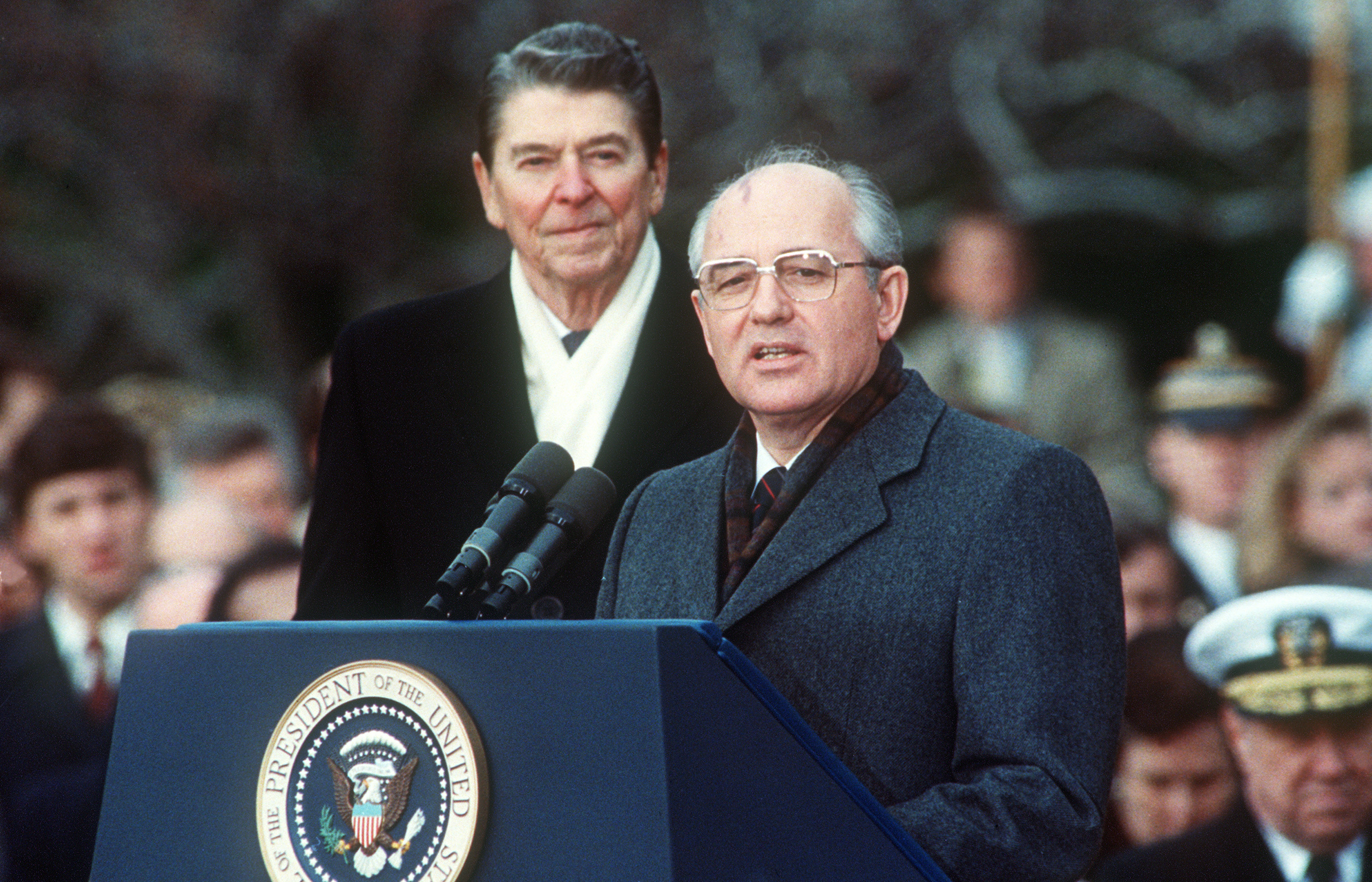 This Dec. 8, 1987, photo shows President Ronald Reagan with Soviet leader Mikhail Gorbachev during welcoming ceremonies at the White House on the first day of their disarmament summit. (JEROME DELAY/AFP via Getty Images)