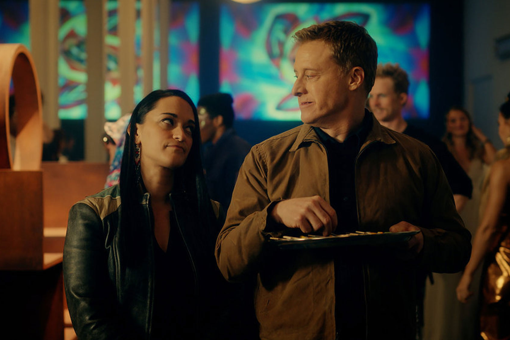 Sara Tomko as Asta Twelvetrees and Alan Tudyk as Harry Vanderspeigle in "Resident Alien" (SYFY)