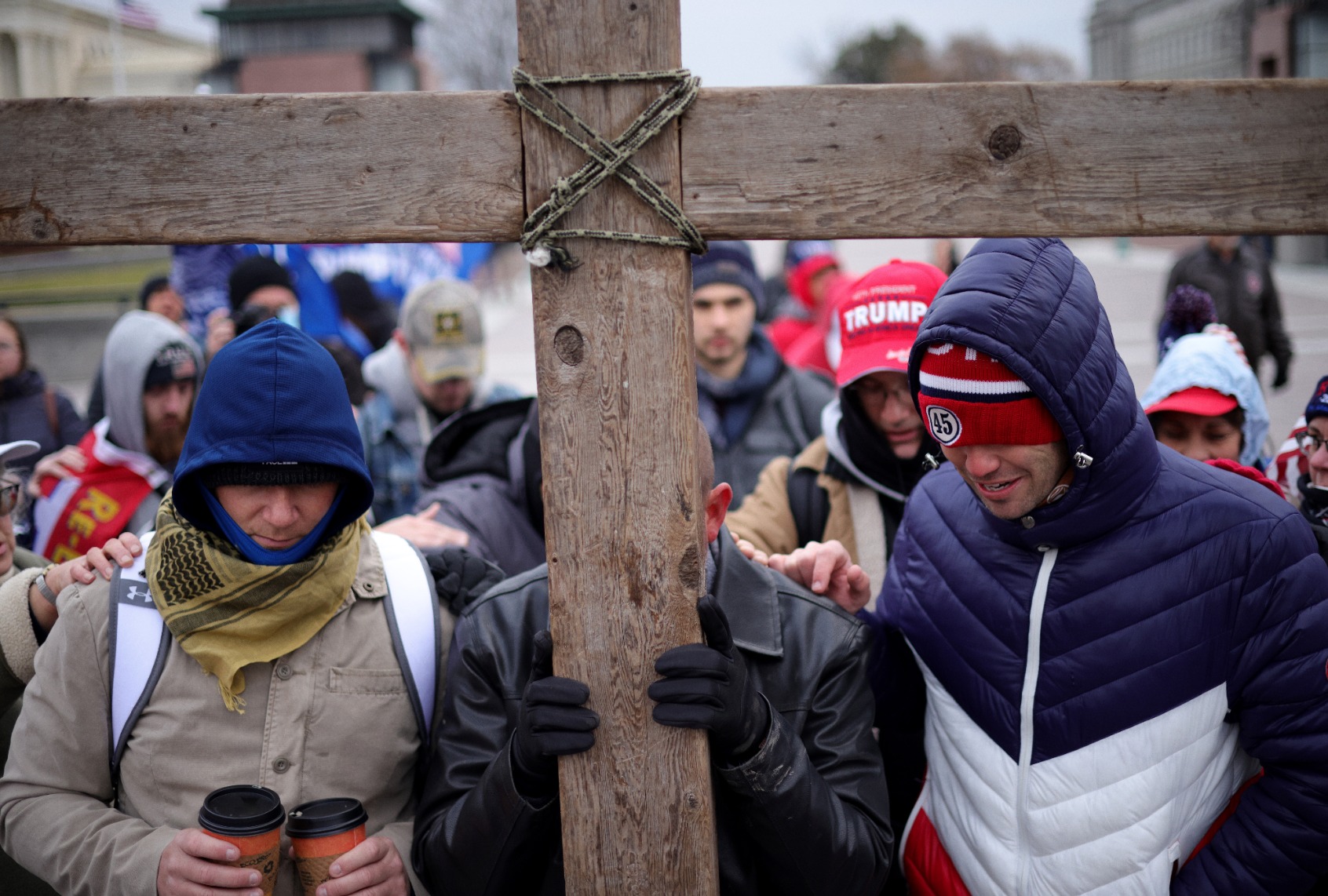 Supporters of U.S. President Donald Trump pray outside the U.S. Capitol January 06, 2021 in Washington, DC. (Win McNamee/Getty Images)