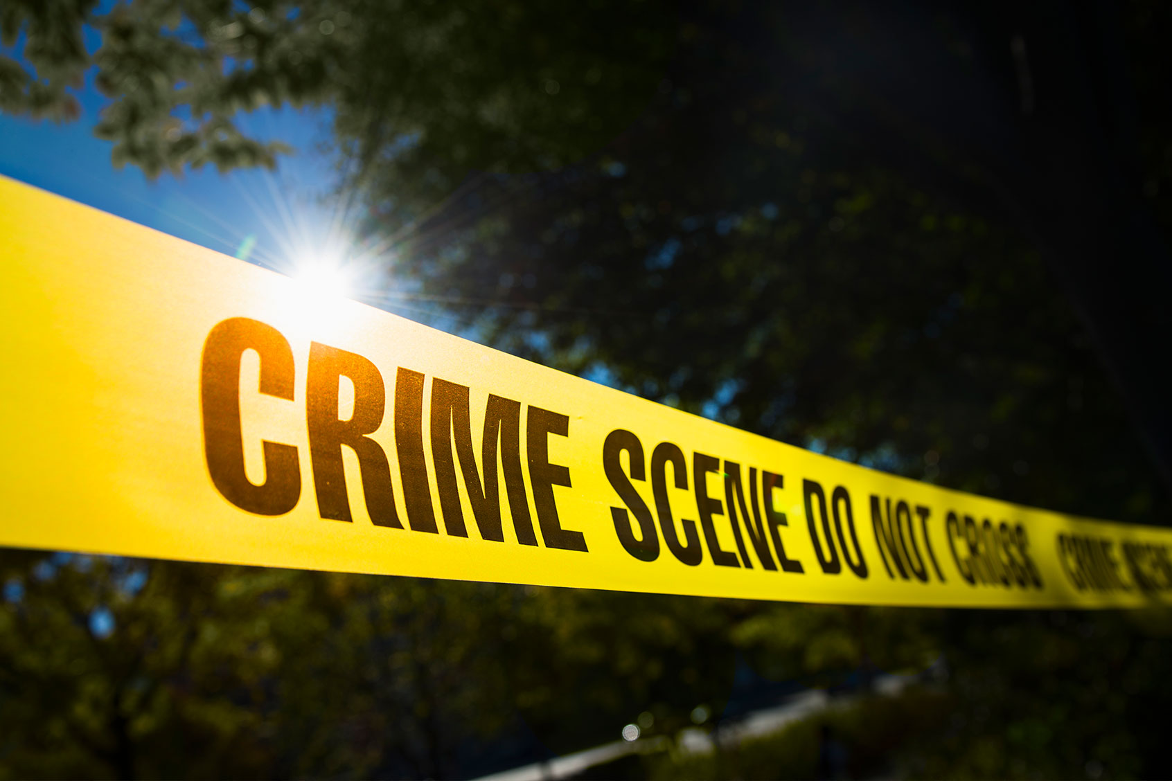 Crime scene barrier tape (Getty Images/Tetra Images)