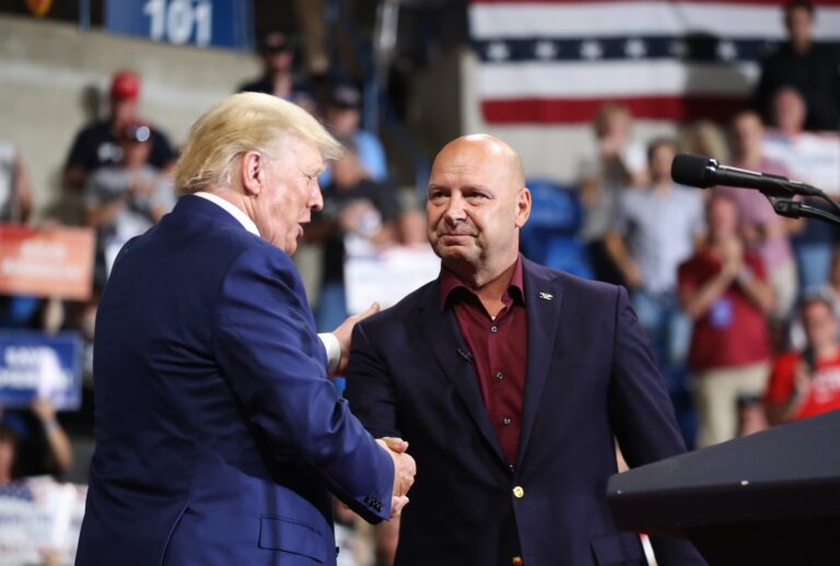 Pennsylvania Republican gubernatorial candidate Doug Mastriano is greeted by former president Donald Trump at a rally at the Mohegan Sun Arena on September 03, 2022 in Wilkes-Barre, Pennsylvania. (Spencer Platt/Getty Images)