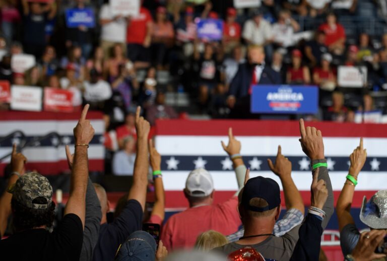 Audience members put their index finger up while former President Donald Trump speaks at a rally to support Republican candidates at the Covelli Centre before on September 17, 2022 in Youngstown, Ohio. (Jeff Swensen/Getty Images)