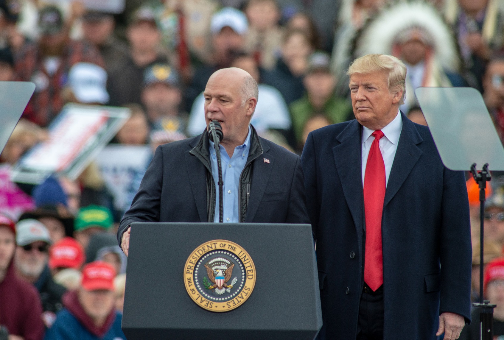Greg Gianforte (R-MT) joins Donald Trump at a "Make America Great Again" rally at the Bozeman Yellowstone International Airport on November 3, 2018 in Belgrade, Montana. (William Campbell/Corbis via Getty Images)