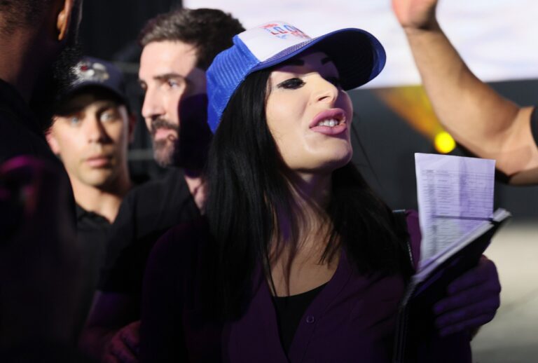 Laura Loomer is escorted out after interrupting Jack Dorsey at the Bitcoin 2021 Convention at the Mana Convention Center in Wynwood on June 04, 2021 in Miami, Florida. (Joe Raedle/Getty Images)