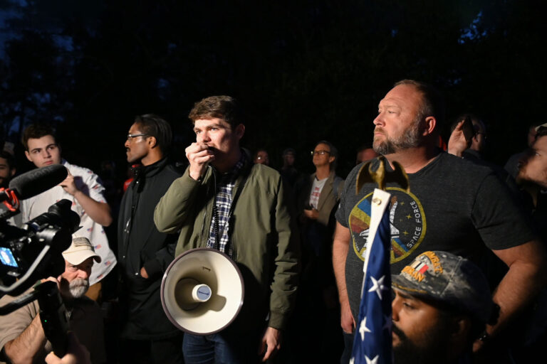 Nick Fuentes, Alex Jones and Ali Alexander during a 'Stop the Steal,' Far-Right Rallies leaders, broadcaster rally at the Governor's Mansion in Georgia November 19th, 2020. (Zach Roberts/NurPhoto via Getty Images)