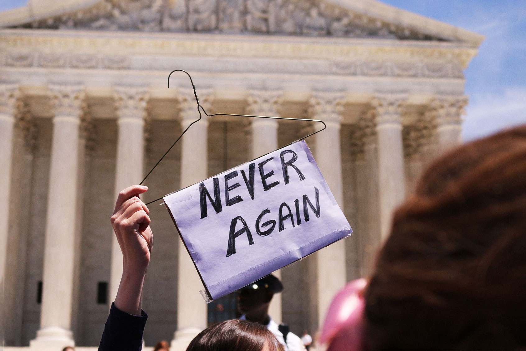 Pro-choice activists join a rally in support of women's rights in front of the US Supreme Court in Washington DC (ANNA-ROSE GASSOT/AFP via Getty Images)