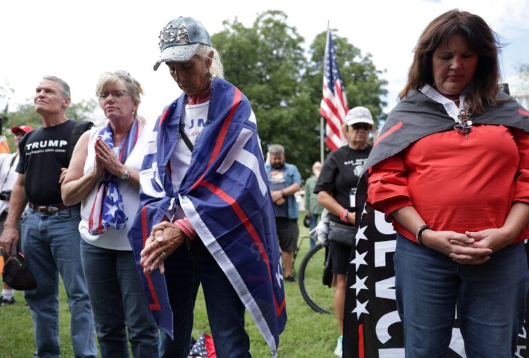 Demonstrators participate in a prayer during a “January 6th Solidarity Truth Rally” near the U.S. Capitol on September 24, 2022 in Washington, DC. (Alex Wong/Getty Images)