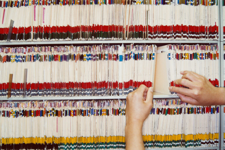 Woman Filing Medical Records (Getty Images/Sean Justice)