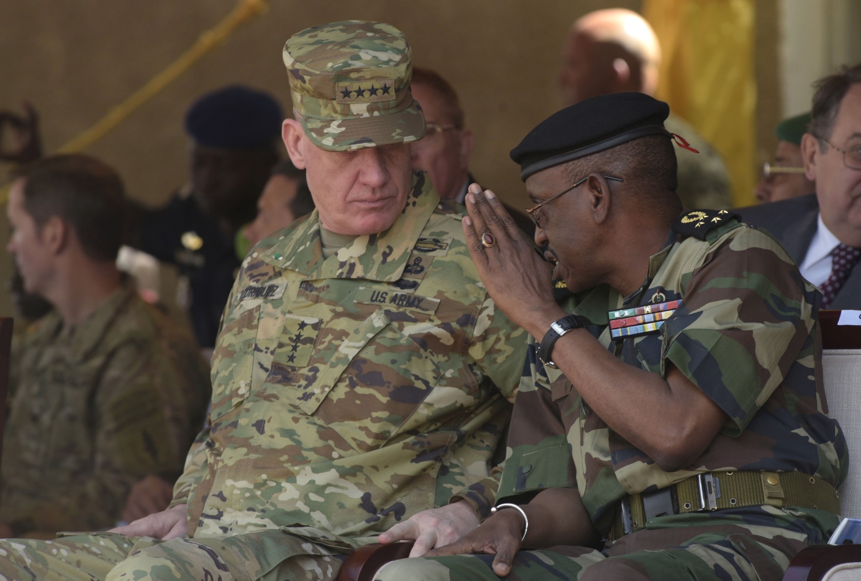Senegalese Chief of Staff Mamadou Sow (R) speaks with former AFRICOM chief General David Rodriguez during three-week joint military exercise between African, US and European troops, known as Flintlock, on February 29, 2016 in Saint Louis. (SEYLLOU/AFP via Getty Images)