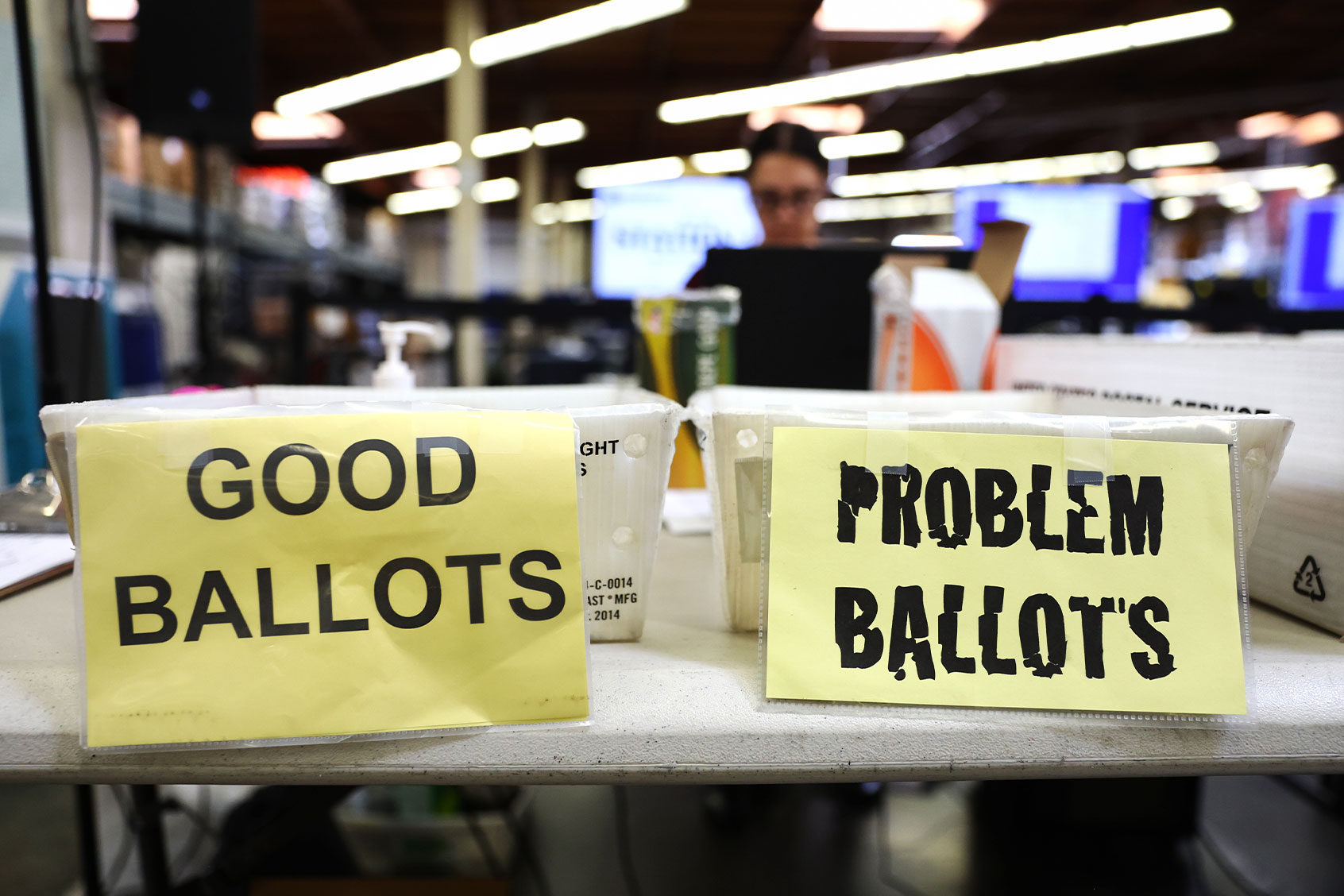 An election worker processes vote-by-mail ballots at the Orange County Registrar of Voters less than two weeks before midterms Election Day on October 27, 2022 in Santa Ana, California. (Mario Tama/Getty Images)
