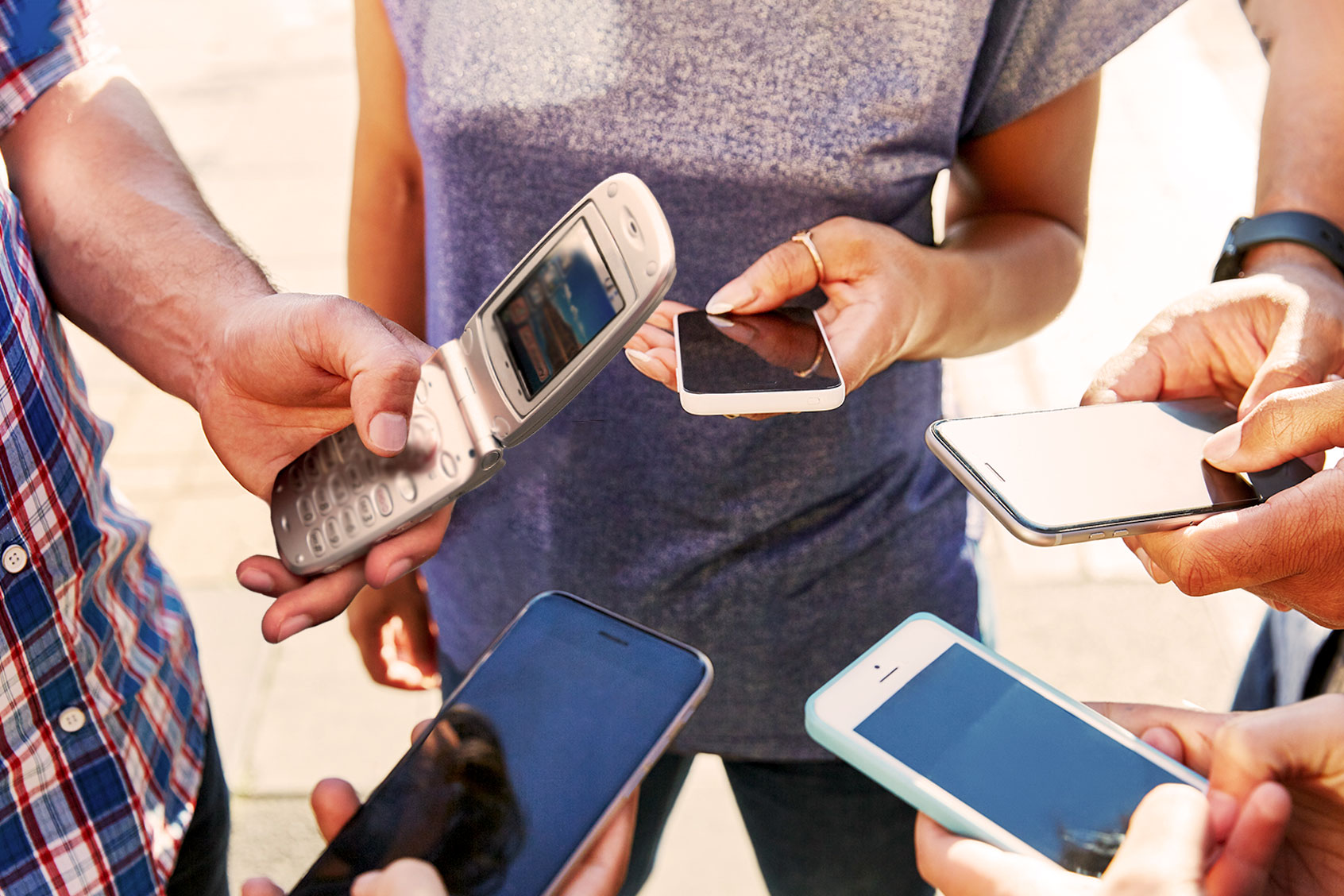 Flip phone amidst the smart phones (Photo illustration by Salon/Getty Images)