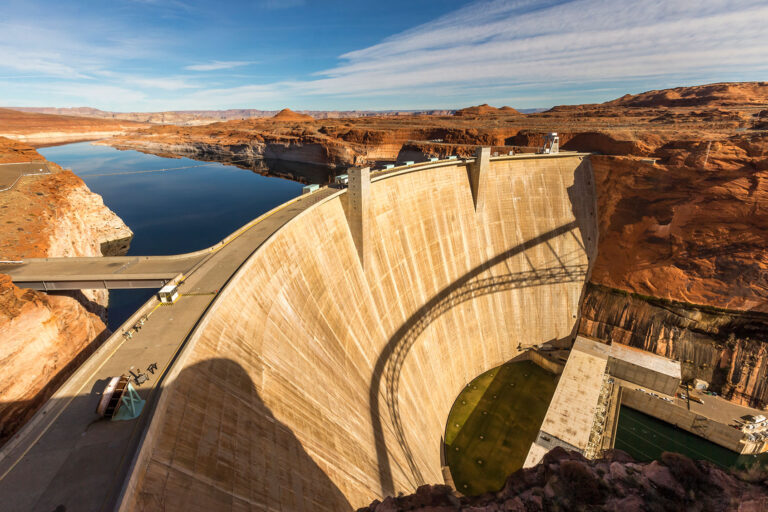 Glen Canyon Dam is a concrete arch dam on the Colorado River in northern Arizona in the United States, near the town of Page. (Getty Images/Spondylolithesis)