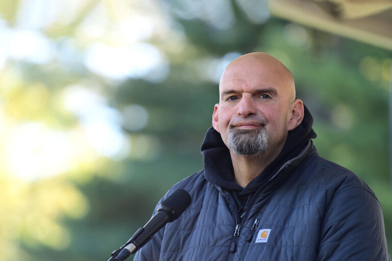 Democratic candidate for U.S. Senate John Fetterman reacts to applause from supporters during a joint rally with Democratic candidate for Governor Pennsylvania Attorney General Josh Shapiro at Norris Park on October 15, 2022 in Philadelphia, Pennsylvania. (Mark Makela/Getty Images)