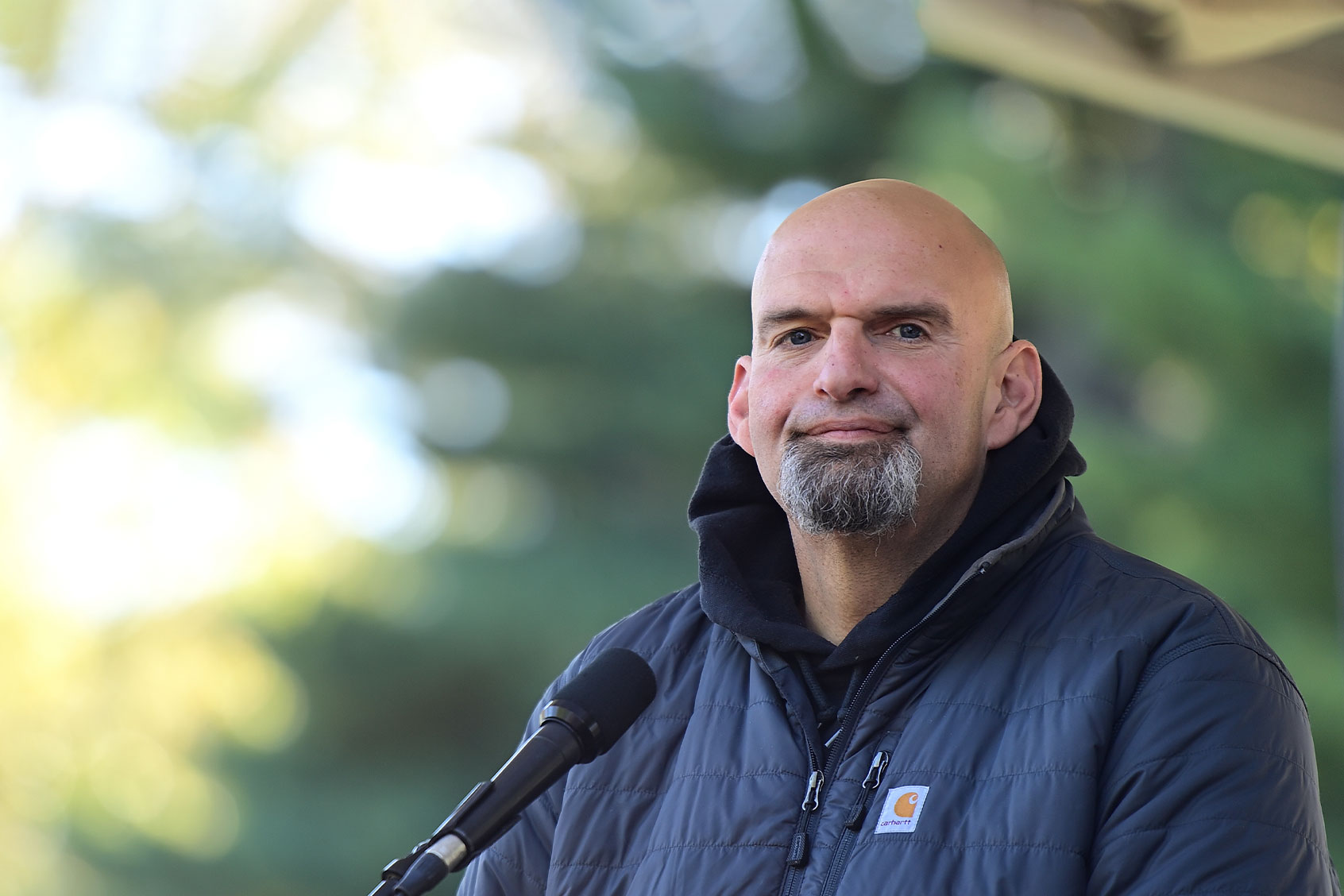 Democratic candidate for U.S. Senate John Fetterman reacts to applause from supporters during a joint rally with Democratic candidate for Governor Pennsylvania Attorney General Josh Shapiro at Norris Park on October 15, 2022 in Philadelphia, Pennsylvania. (Mark Makela/Getty Images)