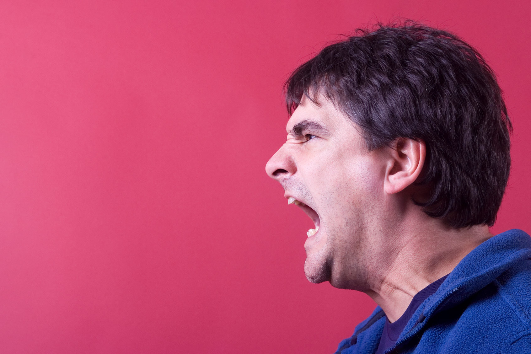 Man screaming his head off (Getty Images/imbarney22)