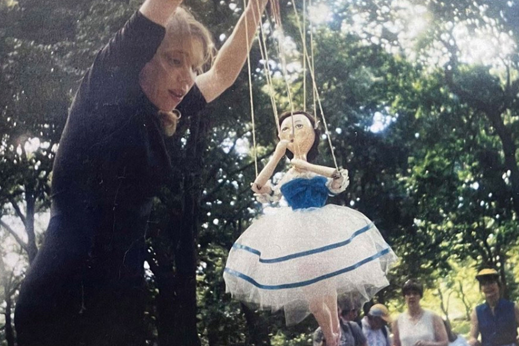 Rachel Hennelly puppeteering her marionettes (Photo courtesy of the estate of Rachel Hennelly)