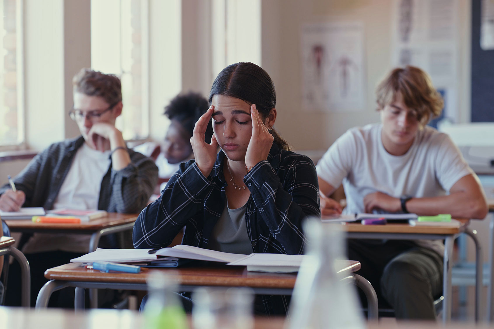 Shot of a student struggling in a classroom (Getty Images/Kobus Louw)