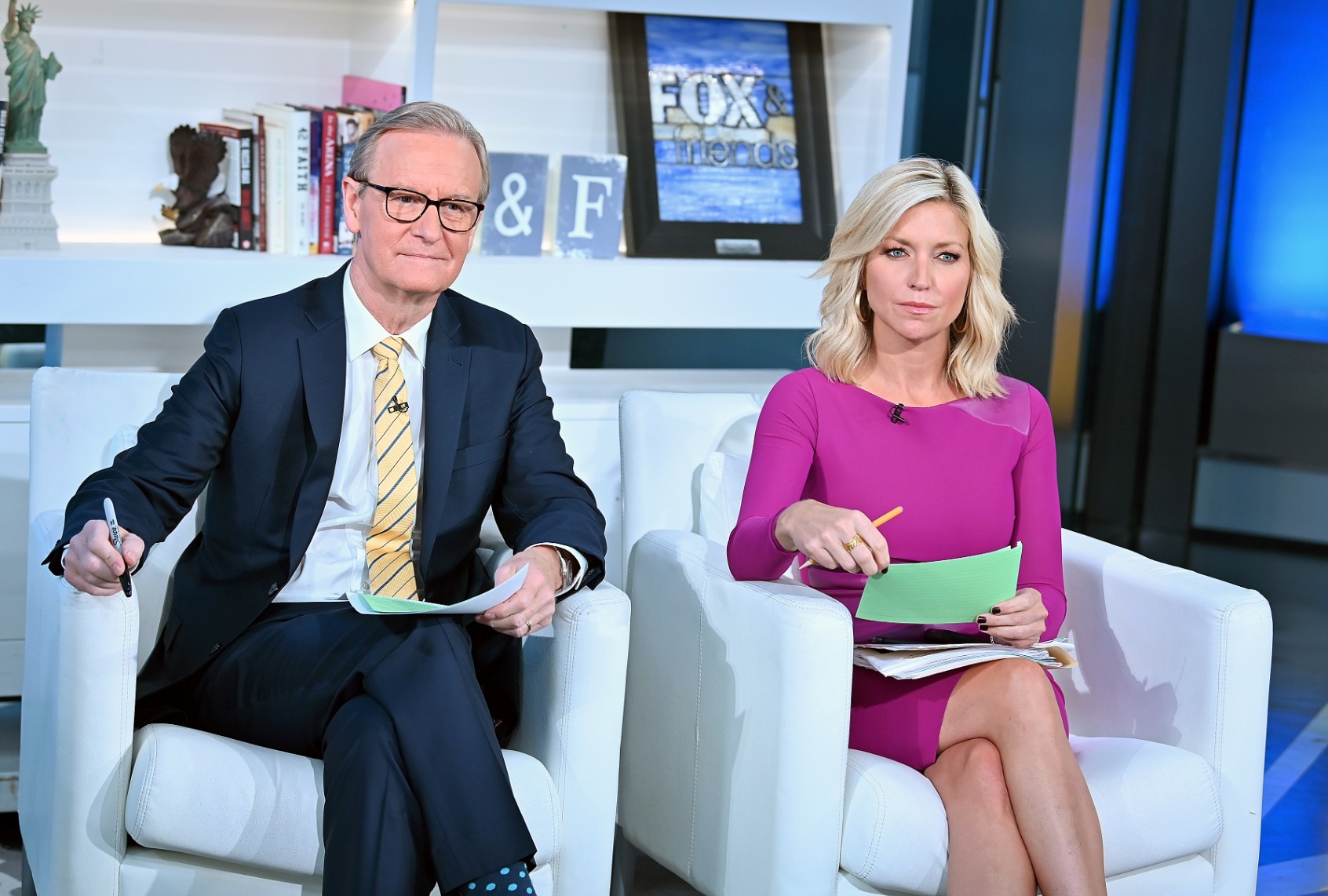 Steve Doocy and Ainsley Earhardt host "FOX & Friends" at Fox News Channel Studios in New York City. (Slaven Vlasic/Getty Images)