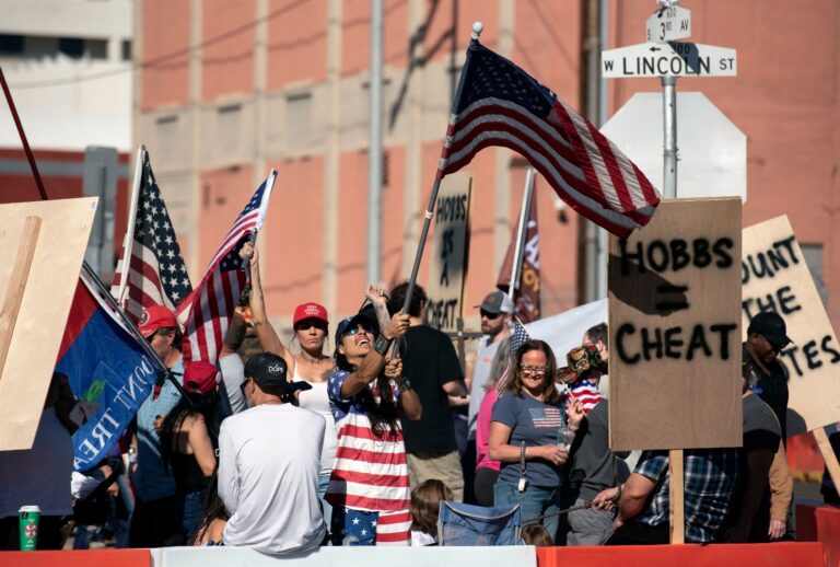 Demonstrators gather at a rally to protest midterm election results outside of Maricopa County Tabulation and Election Center in Phoenix, Arizona, on November 12, 2022. (REBECCA NOBLE/AFP via Getty Images)