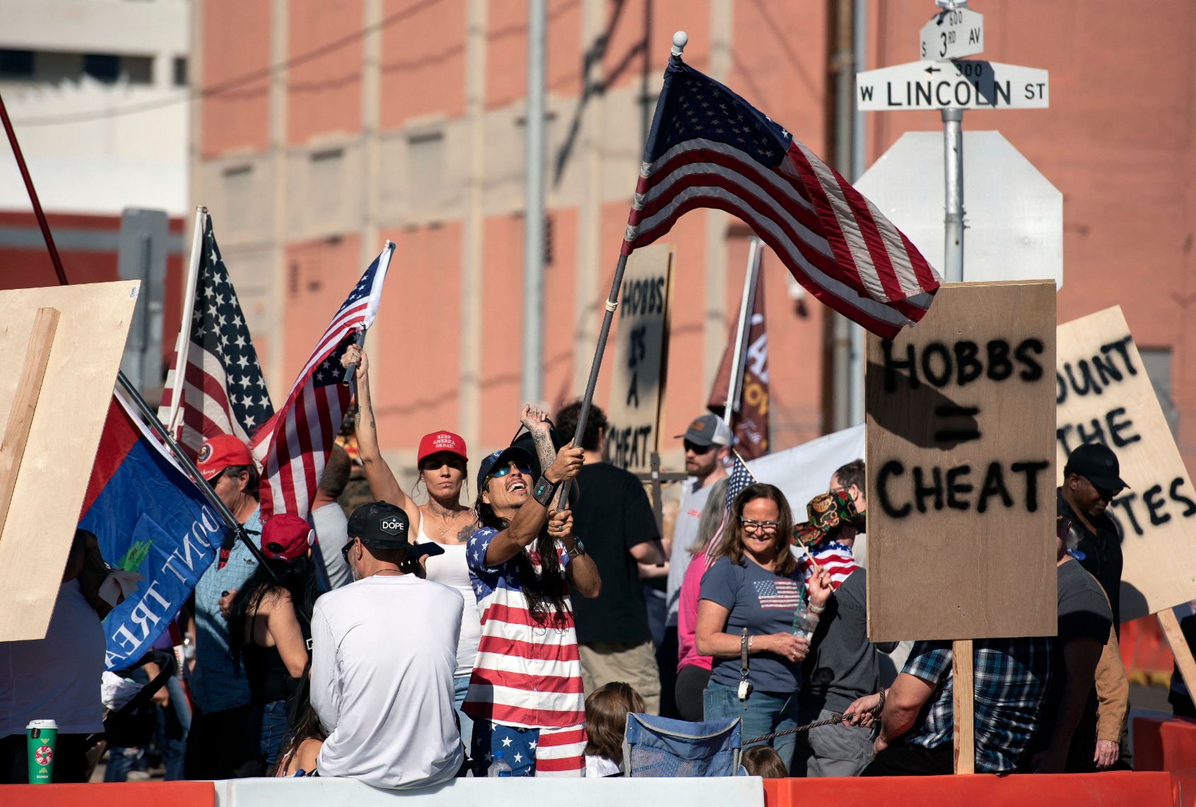 Demonstrators gather at a rally to protest midterm election results outside of Maricopa County Tabulation and Election Center in Phoenix, Arizona, on November 12, 2022. (REBECCA NOBLE/AFP via Getty Images)
