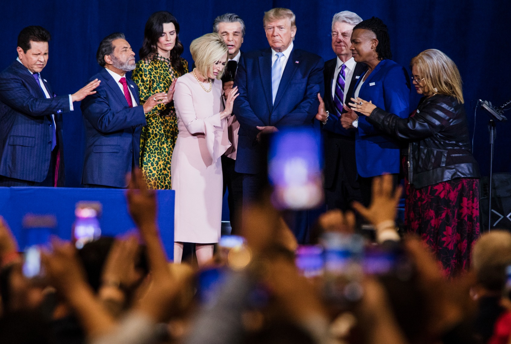 Local religious leaders pray alongside President Donald Trump at the King Jesus International Ministry during an "Evangelicals for Trump" rally in Miami, FL on Friday, Jan. 3, 2020. (Scott McIntyre/For The Washington Post via Getty Images)