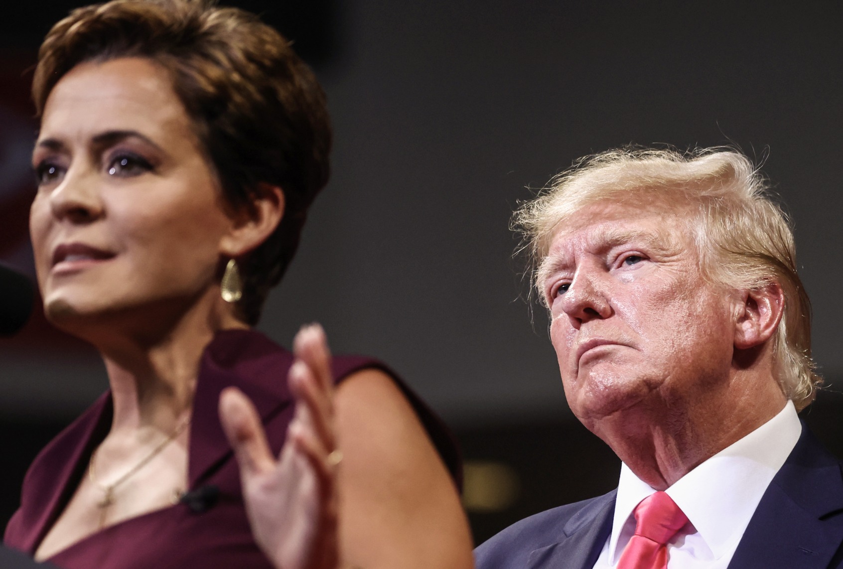 Former President Donald Trump watches Republican candidate for governor Kari Lake speak at a ‘Save America’ rally on July 22, 2022 in Prescott Valley, Arizona. (Mario Tama/Getty Images)