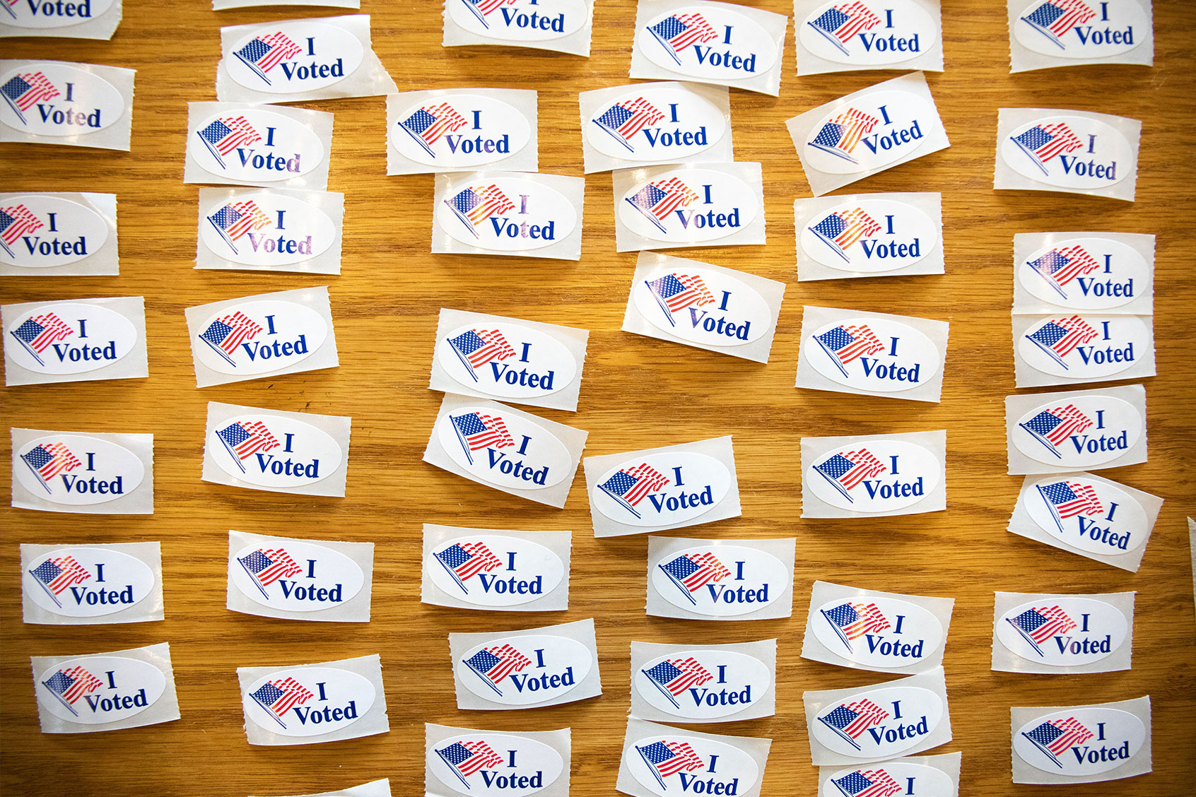 "I Voted" stickers cover a table at a polling station (LOGAN CYRUS/AFP via Getty Images)