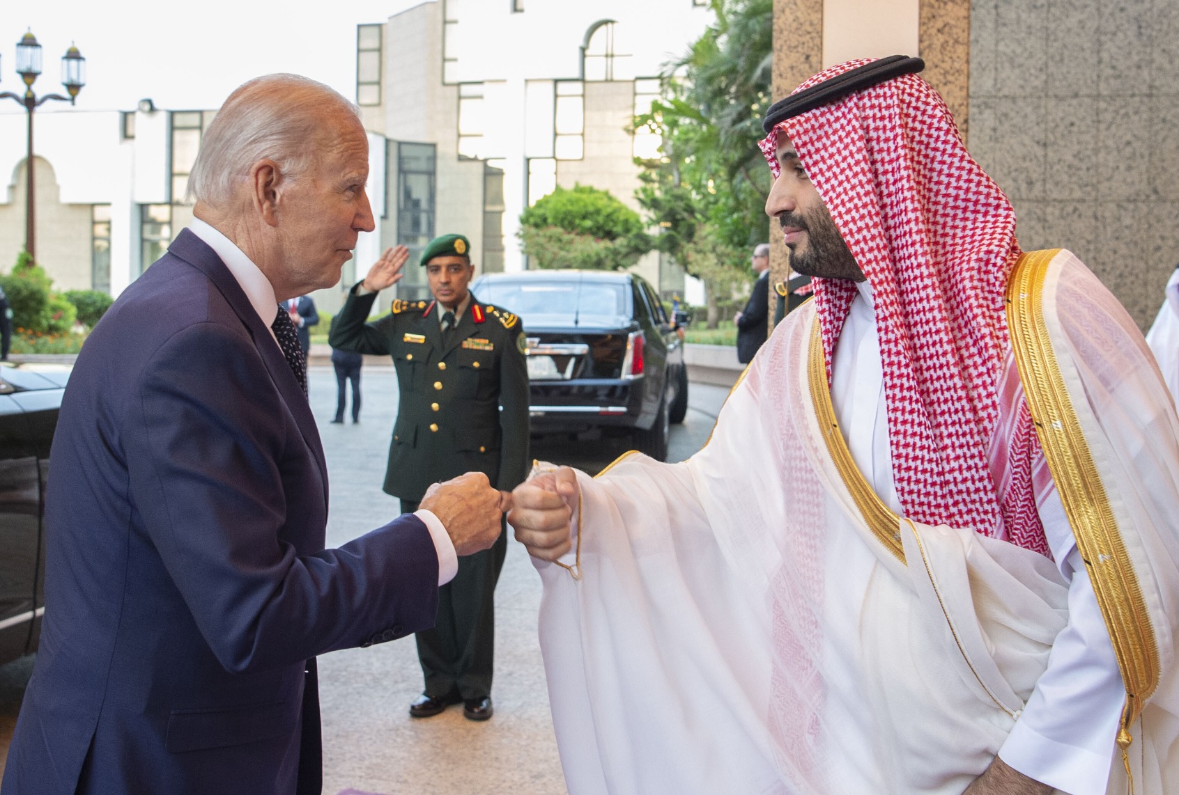President Joe Biden (L) being welcomed by Saudi Arabian Crown Prince Mohammed bin Salman (R) at Alsalam Royal Palace in Jeddah, Saudi Arabia on July 15, 2022. (Royal Court of Saudi Arabia / Handout/Anadolu Agency via Getty Images)
