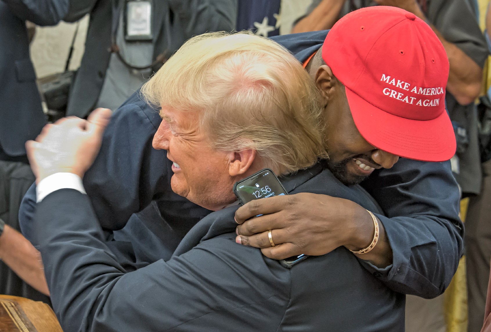 Kanye West embraces Donald Trump in the White House's Oval Office, Washington DC, October 11, 2018. (Ron Sachs/Consolidated News Pictures/Getty Images)