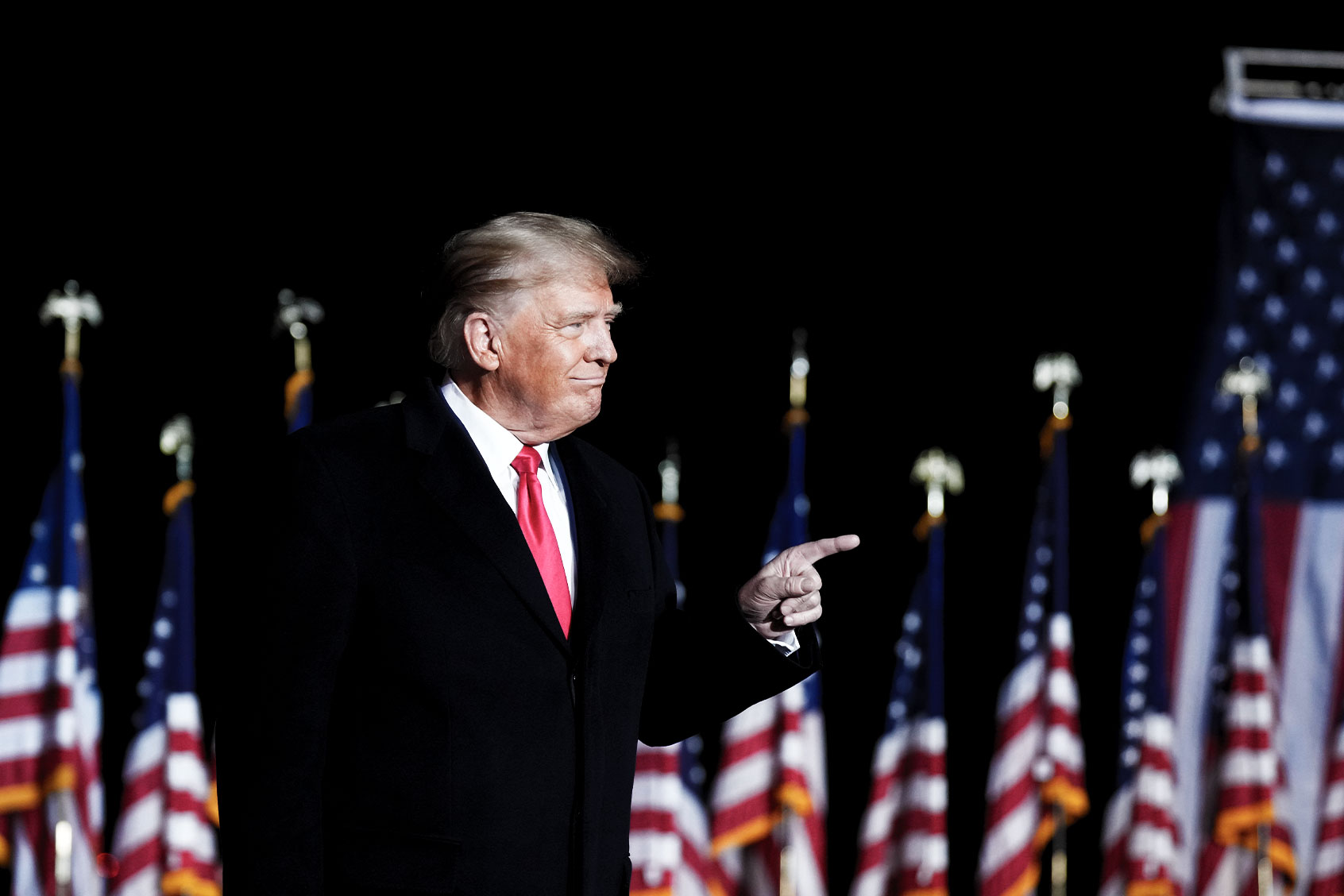 Former U.S. President Donald Trump greets supporters before a rally (Drew Angerer/Getty Images)