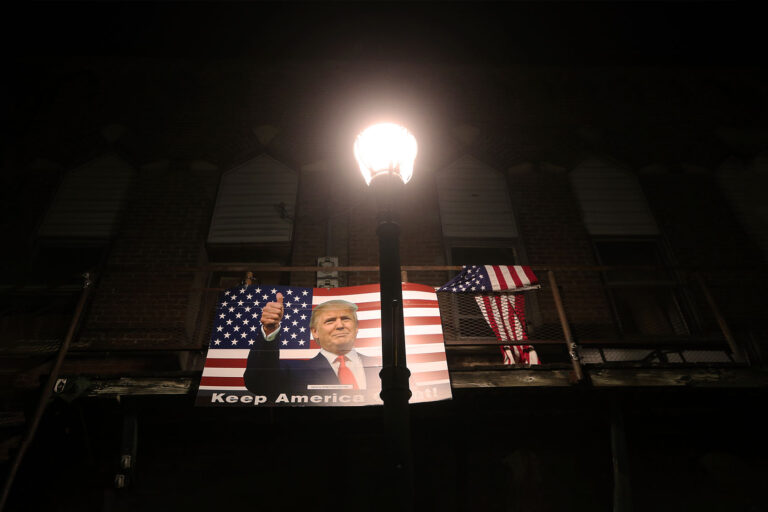 A poster of President Donald Trump is displayed along a street on October 29, 2020 in Winterset, Iowa. (Mario Tama/Getty Images)
