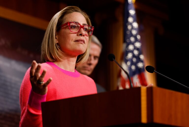 Sen. Kyrtsen Sinema speaks at a news conference after the Senate passed the Respect for Marriage Act at the Capitol Building on November 29, 2022 in Washington, DC. (Anna Moneymaker/Getty Images)