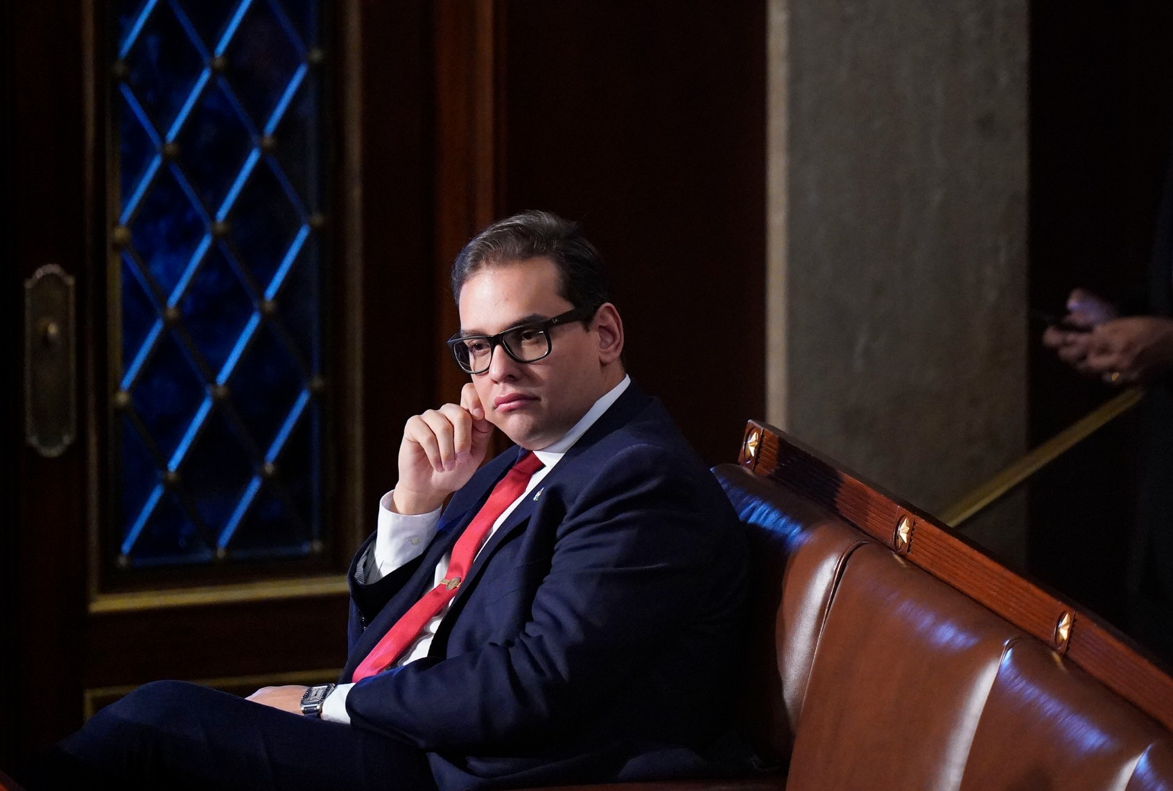 George Santos (R-N.Y.) watches floor proceedings during a meeting of the 118th Congress, Friday, January 6, 2023, at the U.S. Capitol in Washington DC. (Jabin Botsford/The Washington Post via Getty Images)