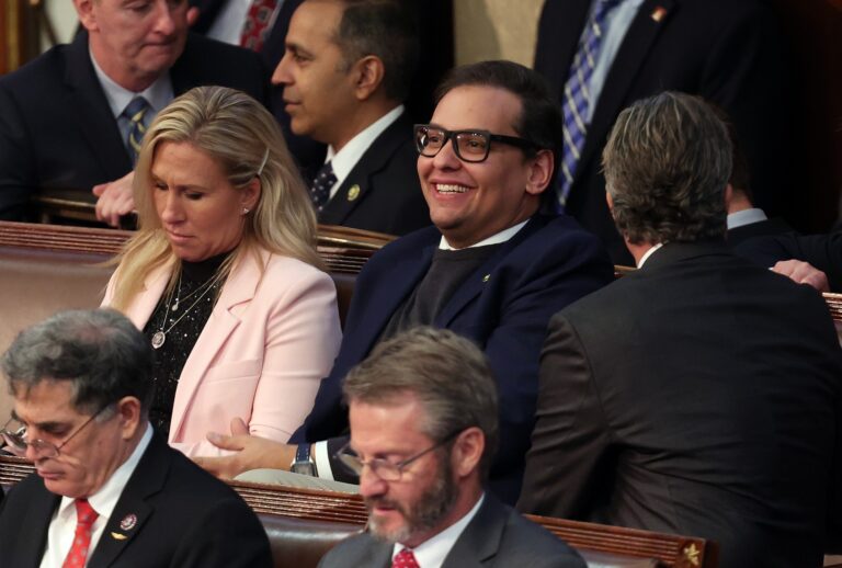 Rep. Marjorie Taylor Greene (R-GA) (L) sits with Rep. George Santos (R-NY) at the U.S. Capitol Building on January 05, 2023 in Washington, DC. (Win McNamee/Getty Images)