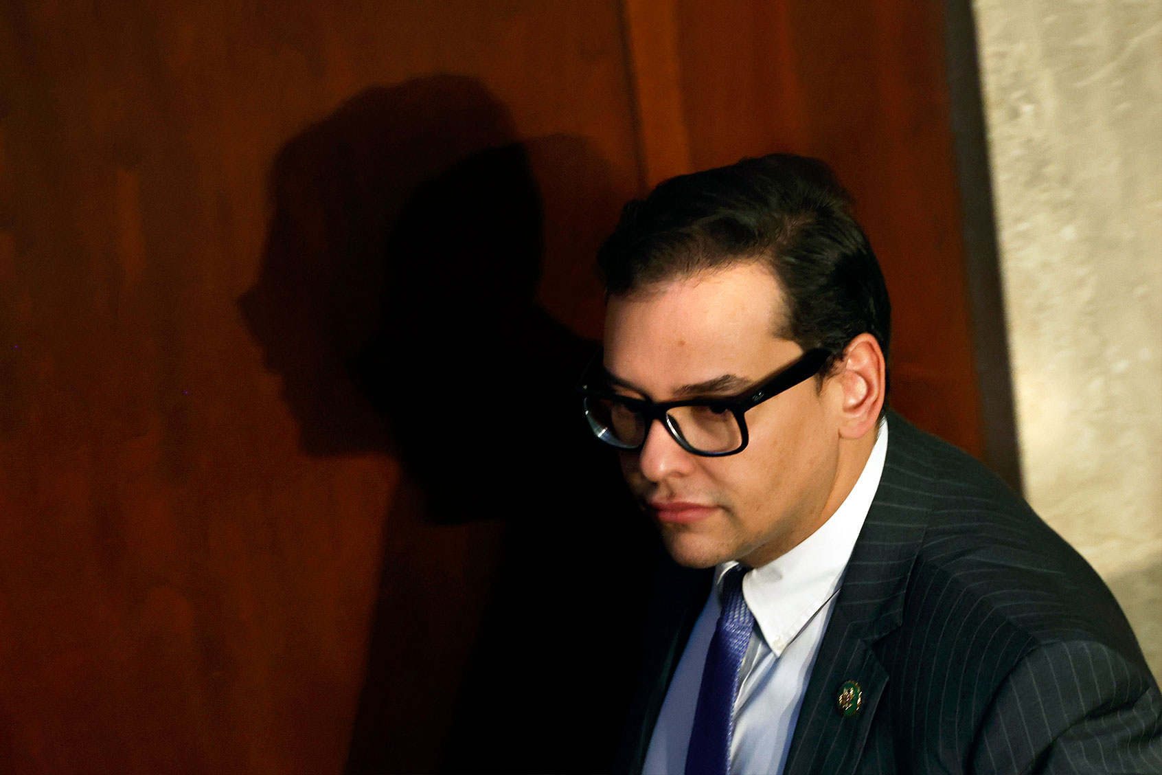 U.S. Rep.-elect George Santos (R-NY) walks in the House Chamber during the second day of elections for Speaker of the House at the U.S. Capitol Building on January 04, 2023 in Washington, DC. (Anna Moneymaker/Getty Images)