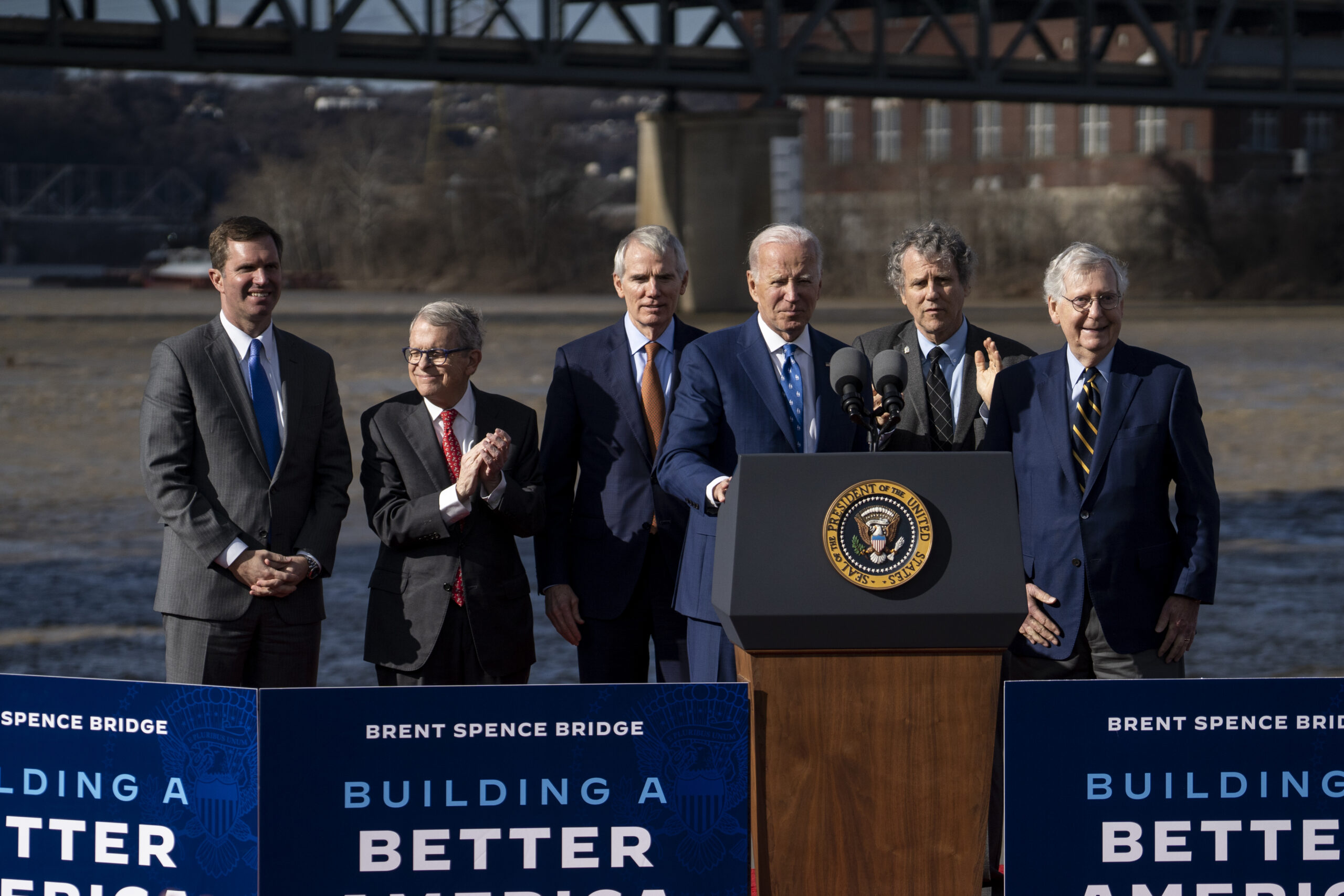 President Joe Biden appears on stage with Kentucky Gov. Andy Beshear, Ohio Gov. Mike DeWine, former Ohio Sen. Rob Portman, Ohio Sen. Sherrod Brown and Kentucky Sen. Mitch McConnell on Jan. 4, 2023, in Covington, Kentucky. (Michael Swensen/Getty Images)