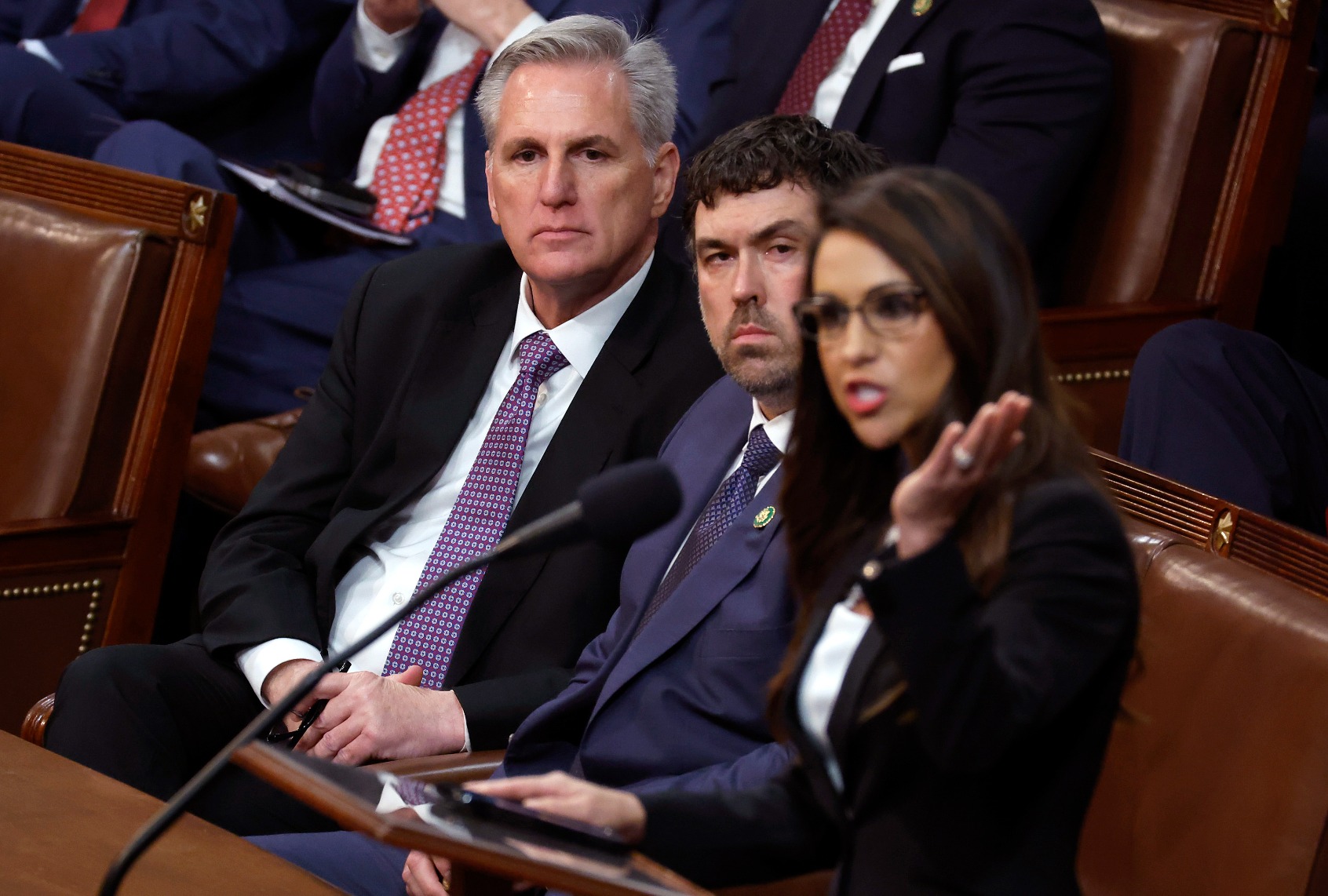 House Republican Leader Kevin McCarthy (L) listens as Rep. Lauren Boebert (R-CO) (R) delivers remarks in the House Chamber during the second day of elections for Speaker of the House at the U.S. Capitol Building on January 04, 2023 in Washington, DC. (Chip Somodevilla/Getty Images)